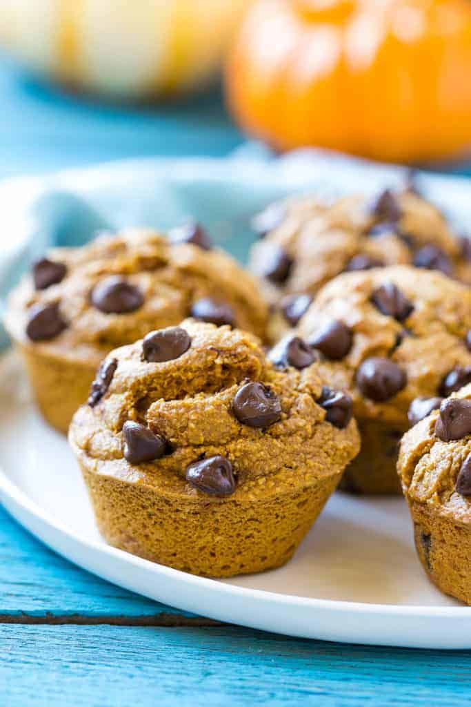 muffins with chocolate chips on a white plate 