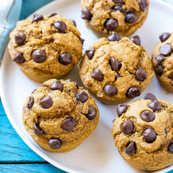 pumpkin Muffins with chocolate chips on a white plate.