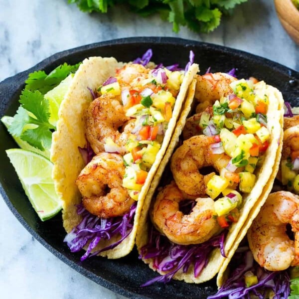 three shrimp tacos on plate