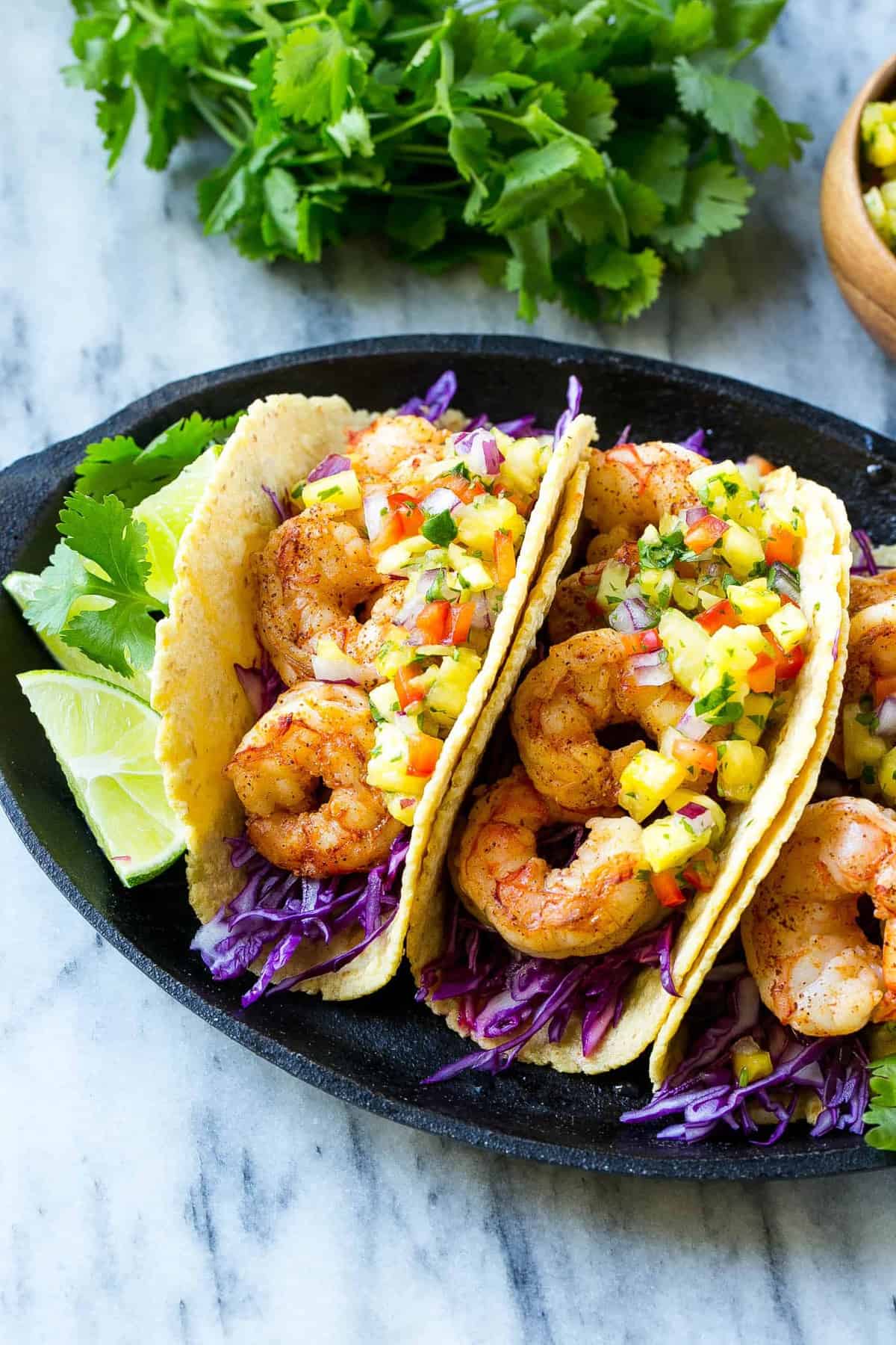 three shrimp tacos on plate 