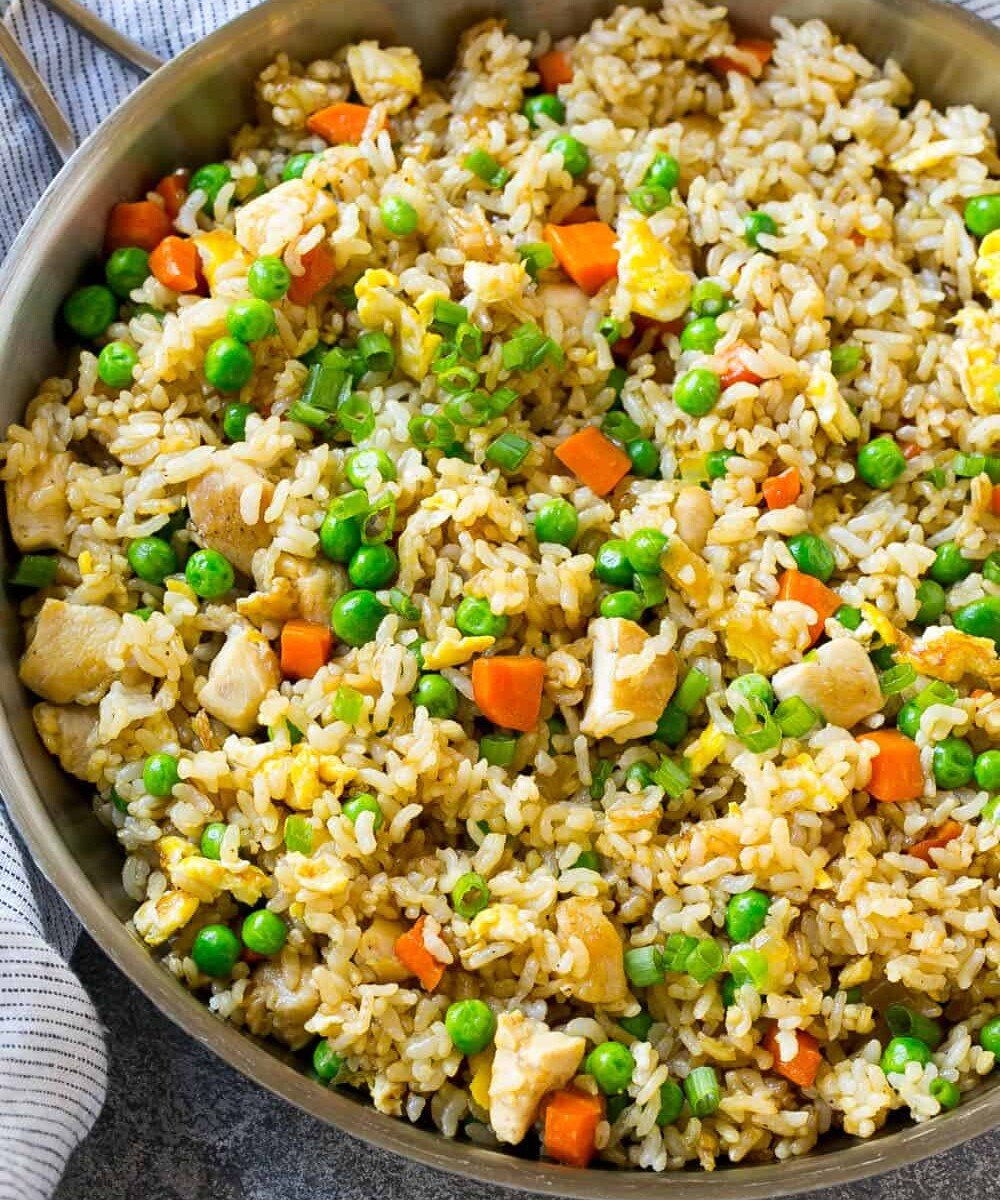 chicken fried rice in a skillet.