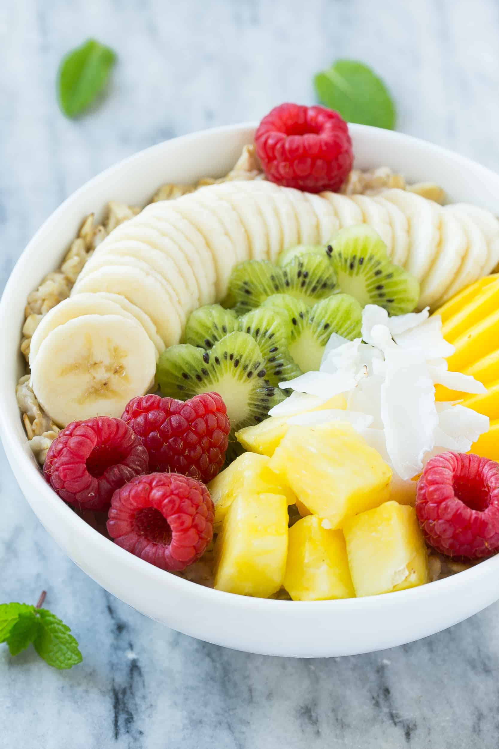 Simple Summer Breakfast with Skyr, Fresh Fruit, Oats and Nuts - nocrumbsleft