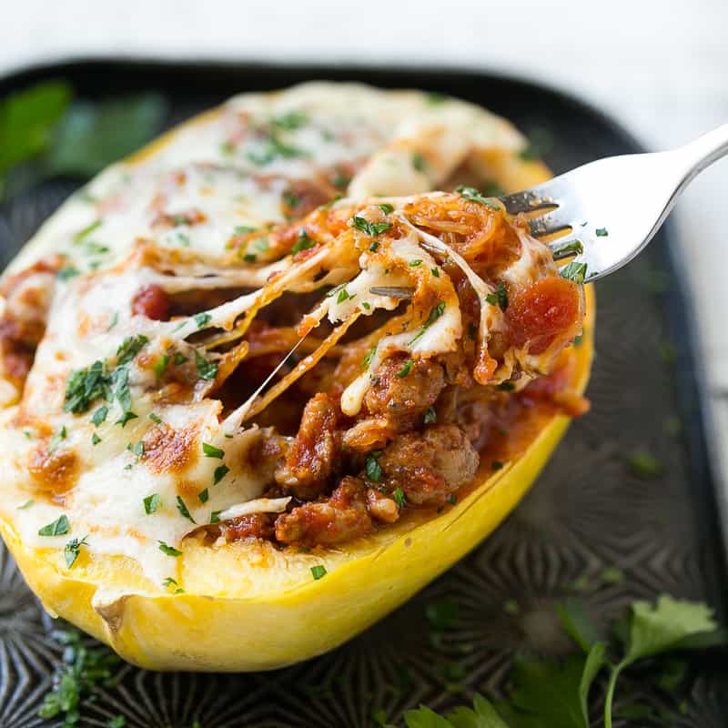 a fork going in a stuffed spaghetti squash