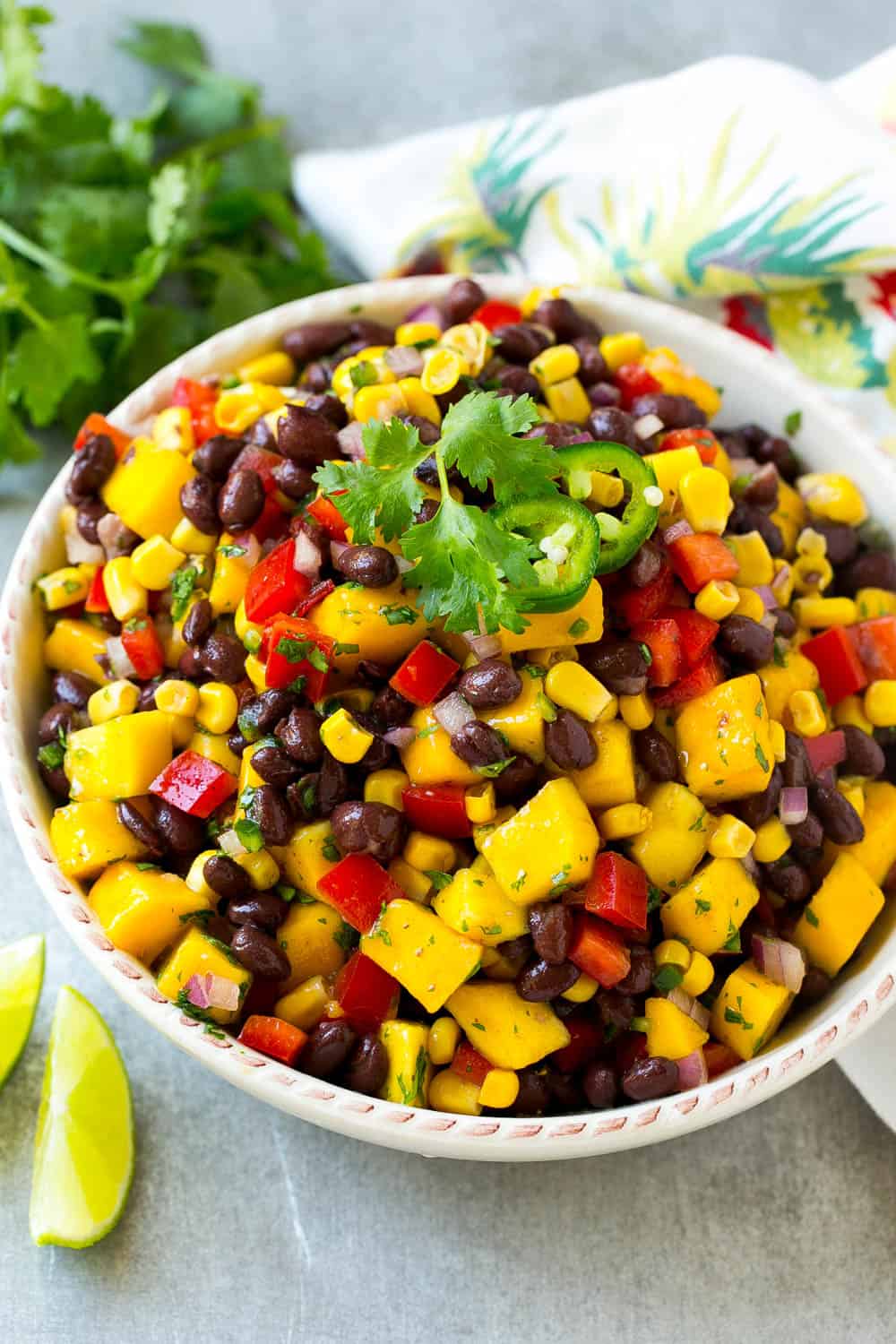 mango black bean salad in a round bowl.