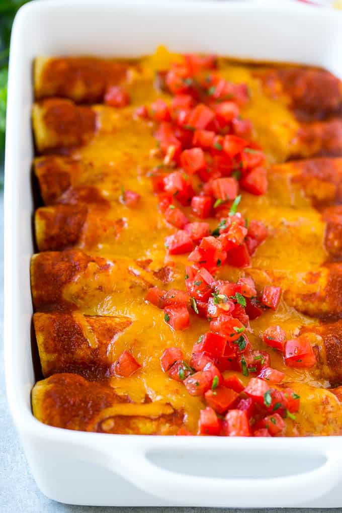 overhead shot of enchiladas in a white dish