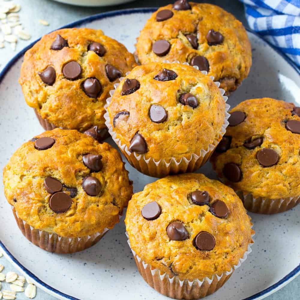 top view of banana and chocolate oatmeal muffins on plate 