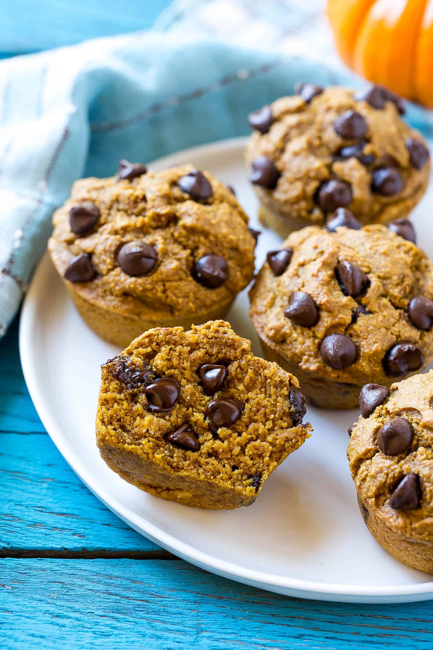 healthy pumpkin muffins with chocolate chips on a plate