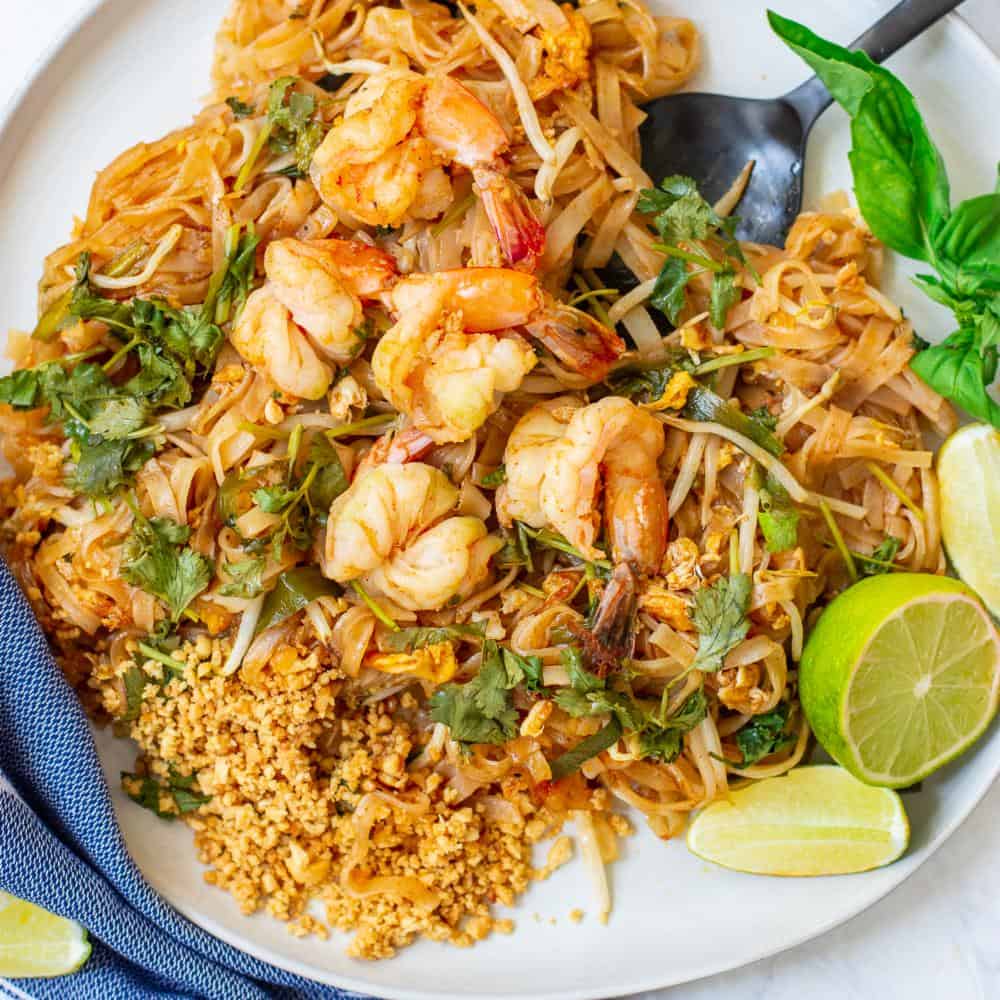 overhead shot of Shrimp Pad Thai on a white plate