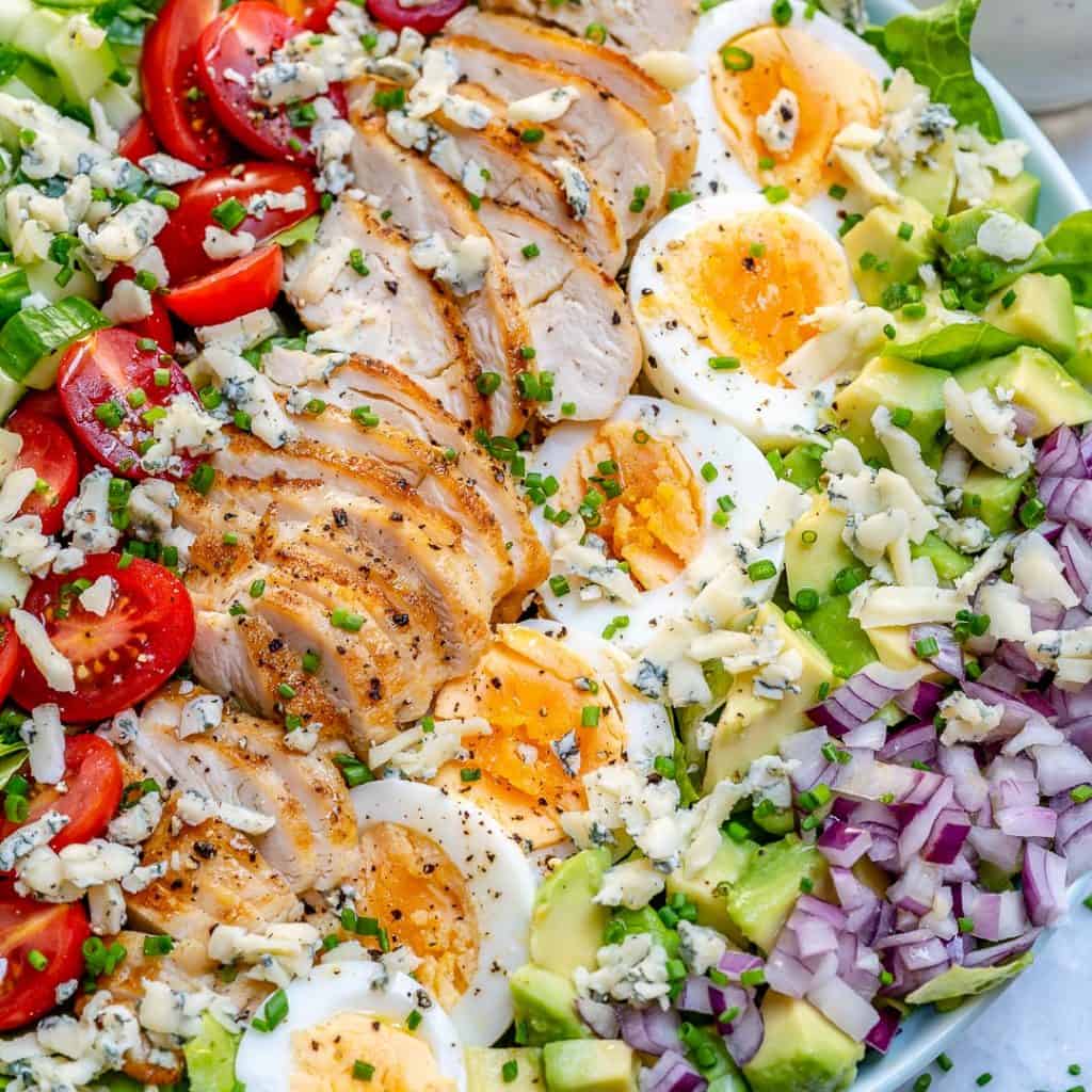 close up view of chicken cobb salad in a dish