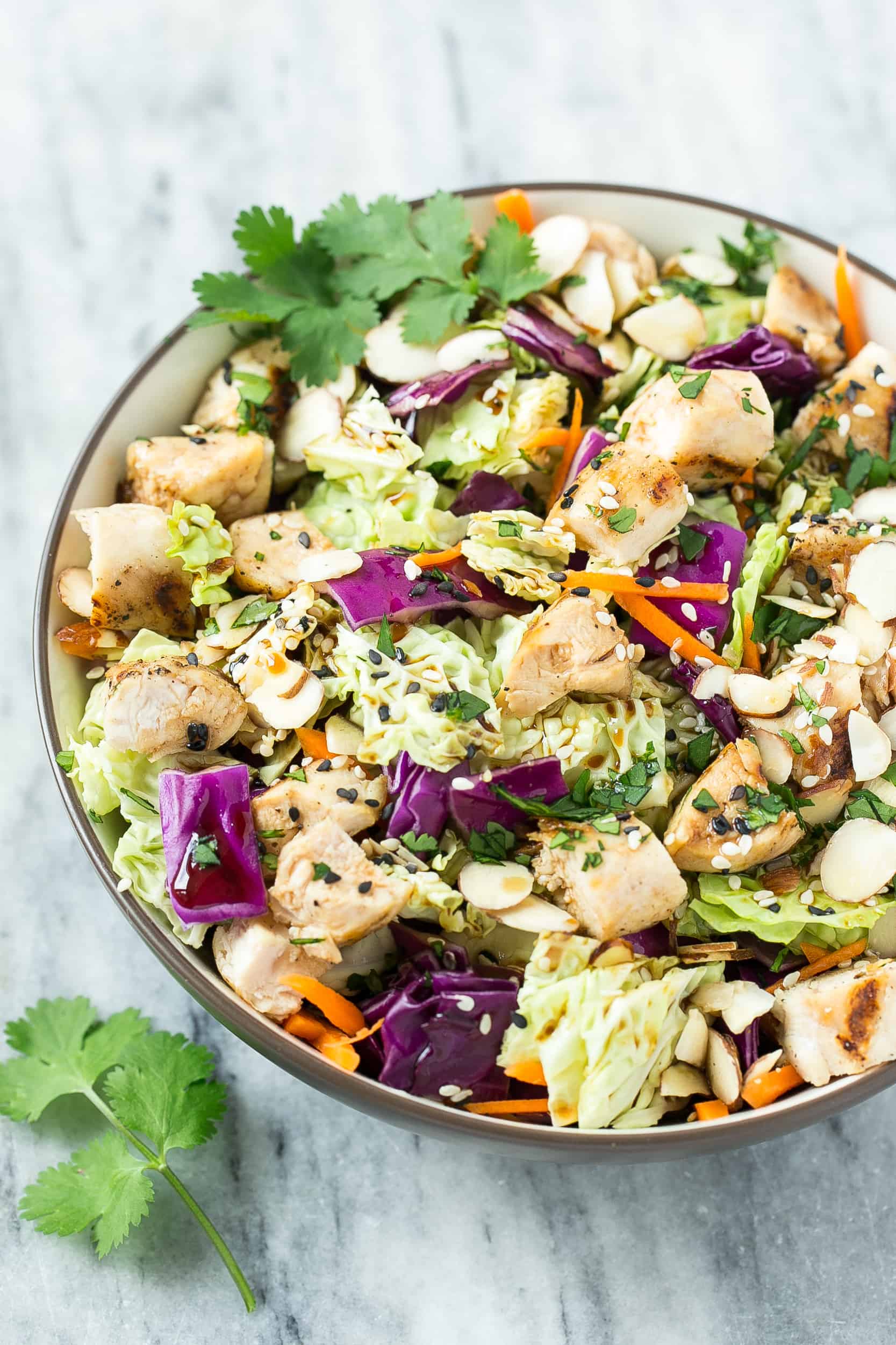 top view of salad bowl with chopped chicken 