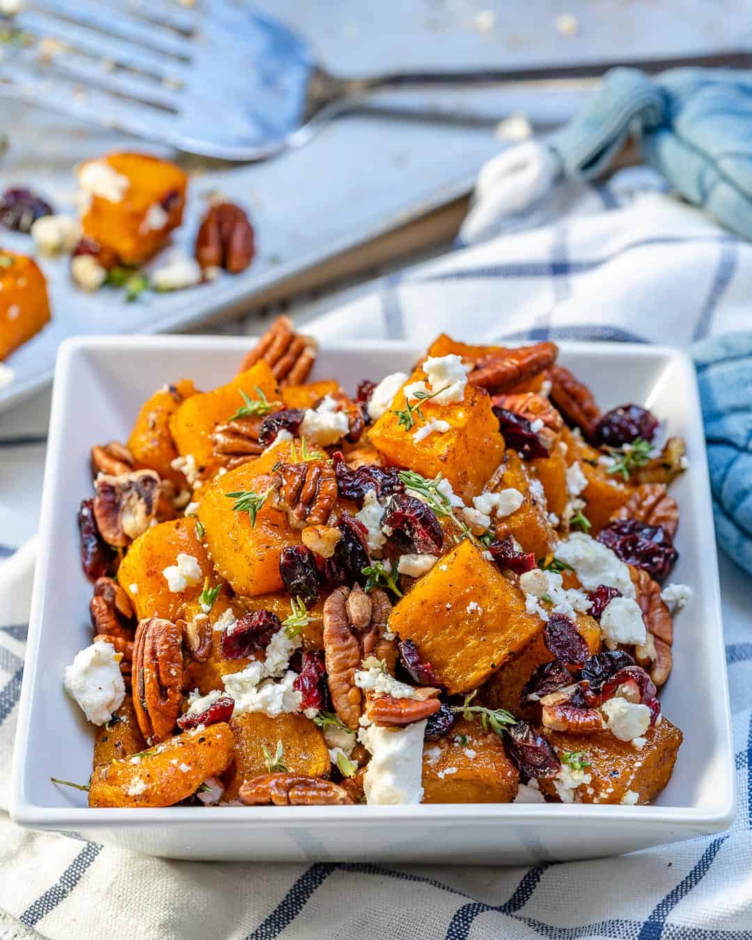 roasted squash with cranberry, feta cheese and pecan