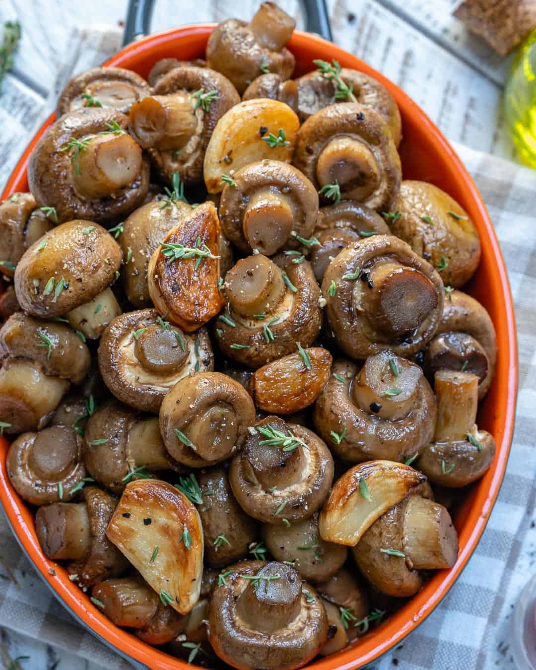 bowl of garlic mushrooms with thyme
