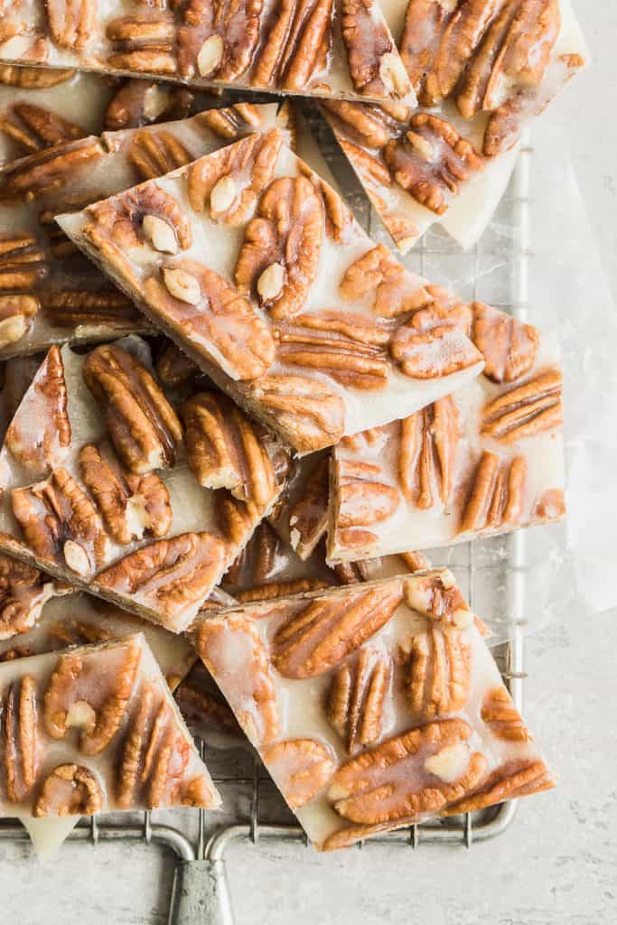 square bars of keto pecan brittle on a wire wrack