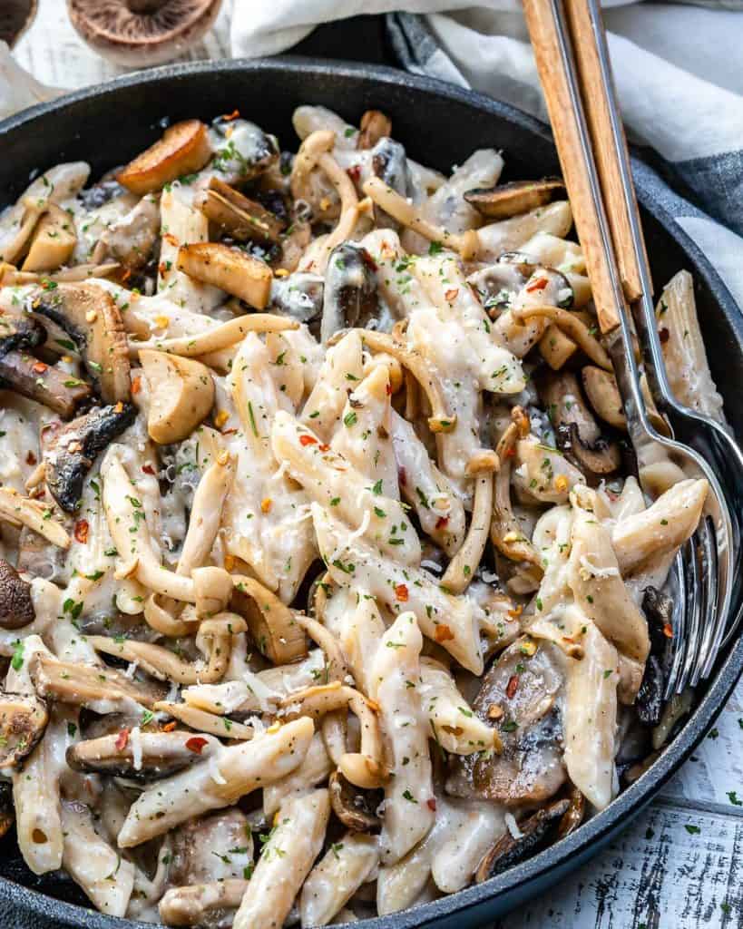 top view creamy mushroom pasta in a skillet