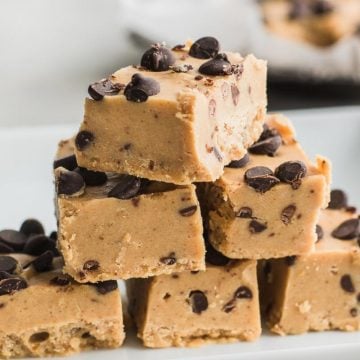cookie dough fudge in a pile on white surface