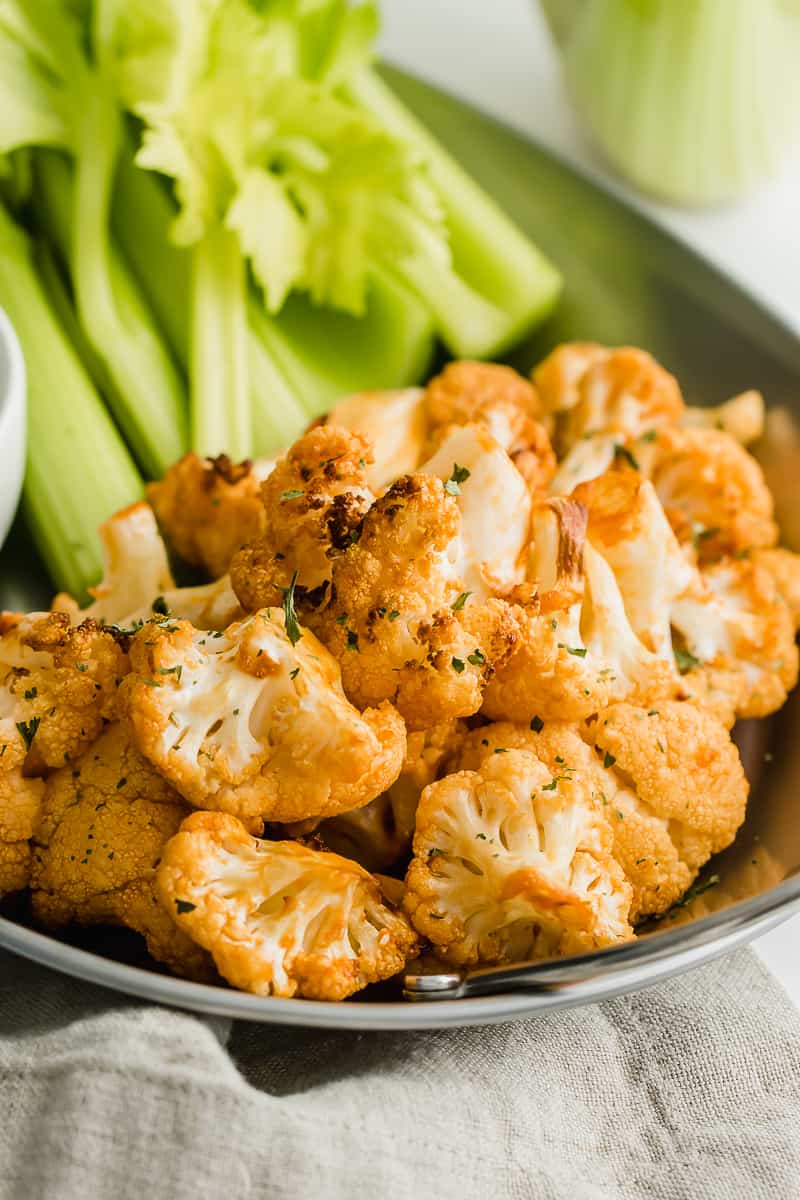 roasted cauliflower with buffalo sauce and celery