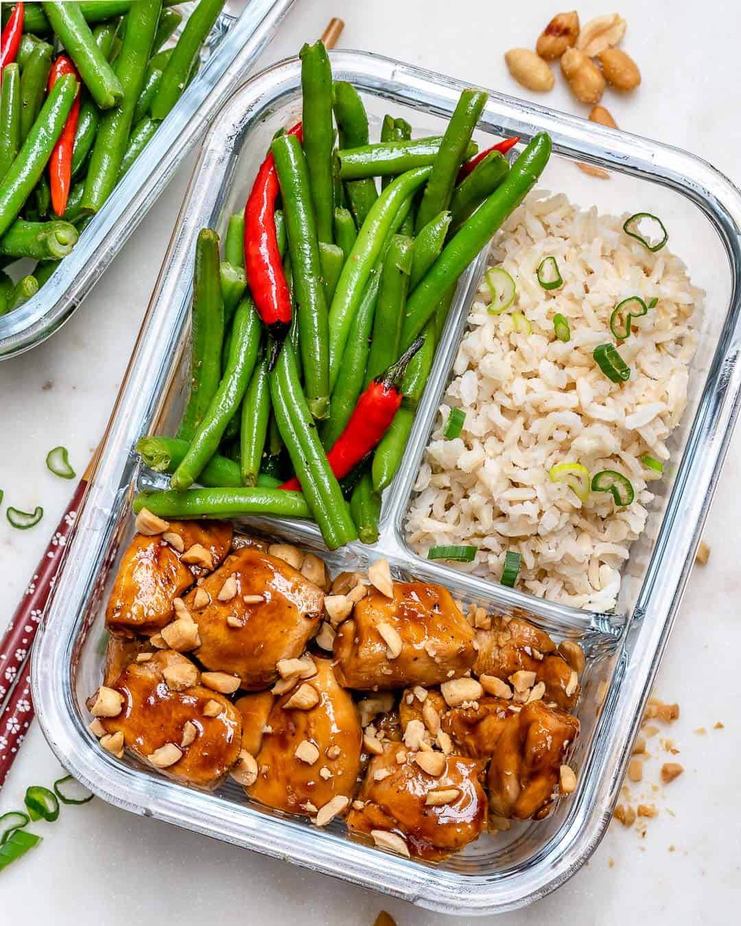 beans. chicken and rice in a meal prep container. 