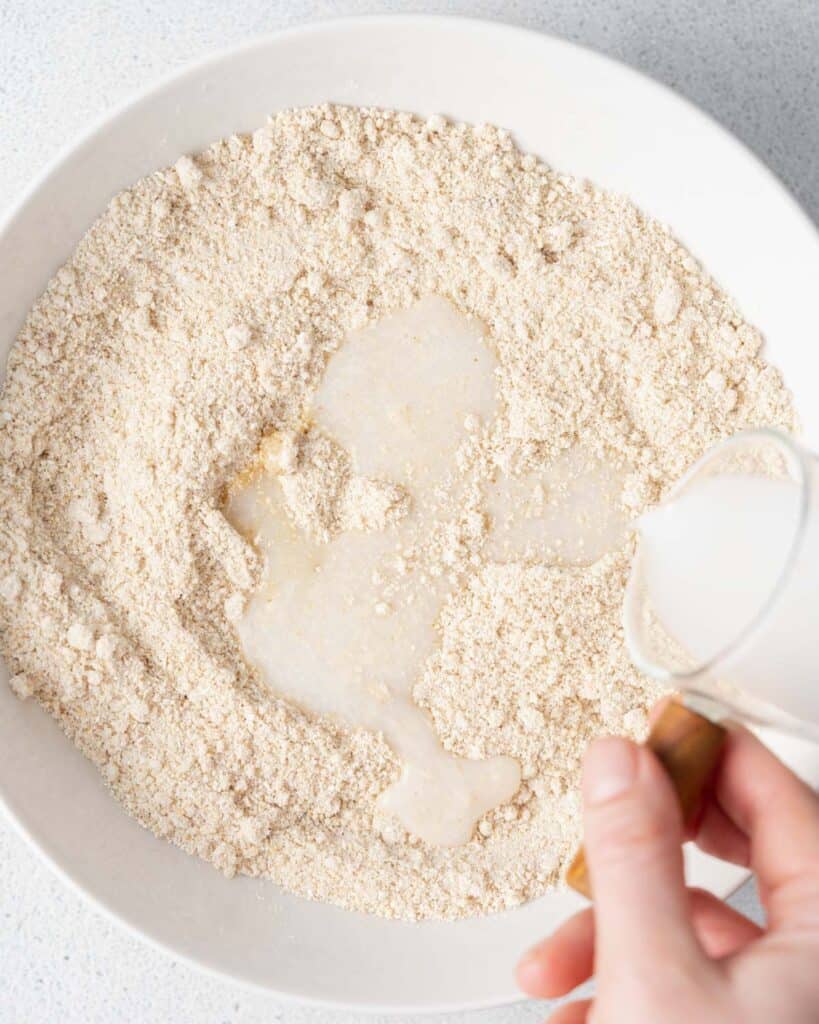 almond milk added over a mix of flour