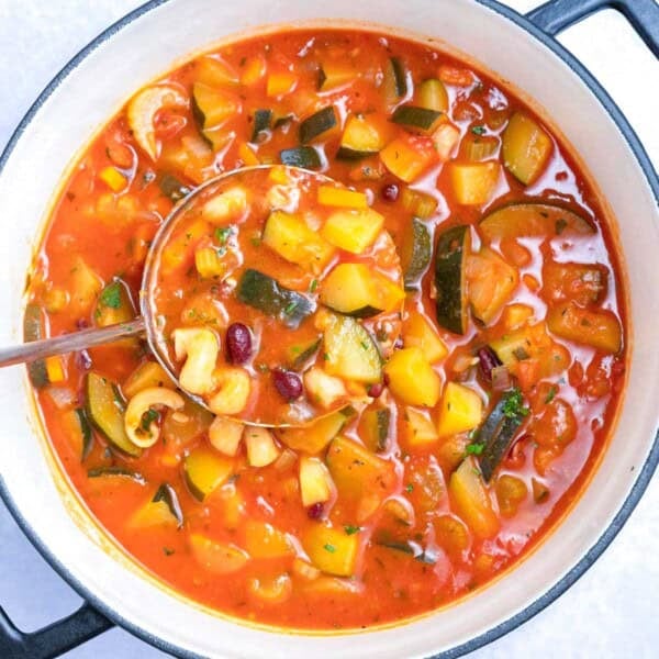 A pot of vegetable minestrone soup.
