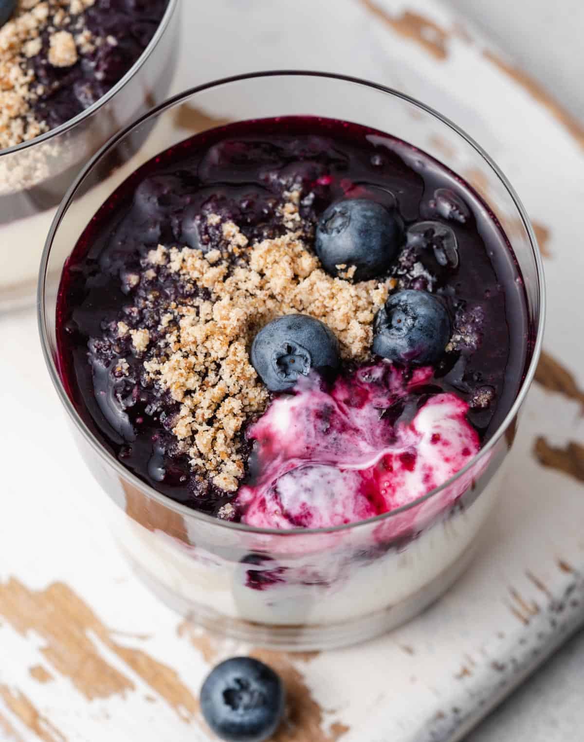 a cup of no-bake blueberry cheesecake .