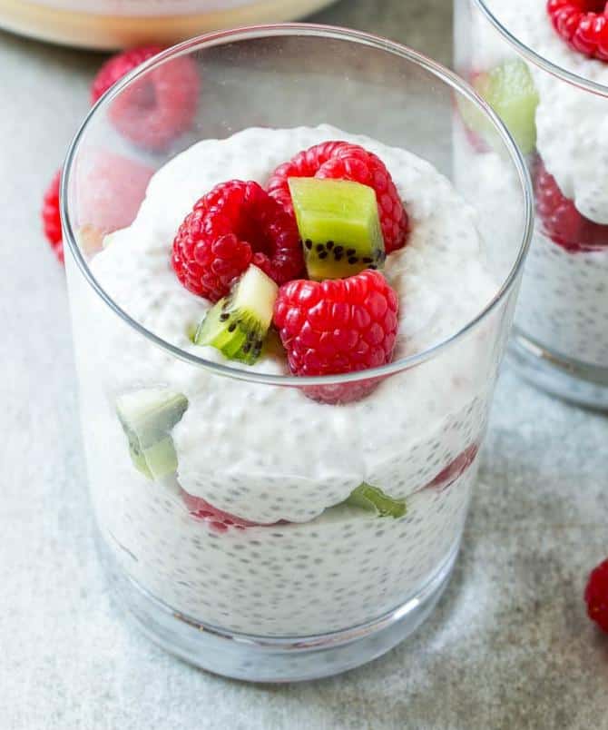 coconut chia pudding in dish with berries