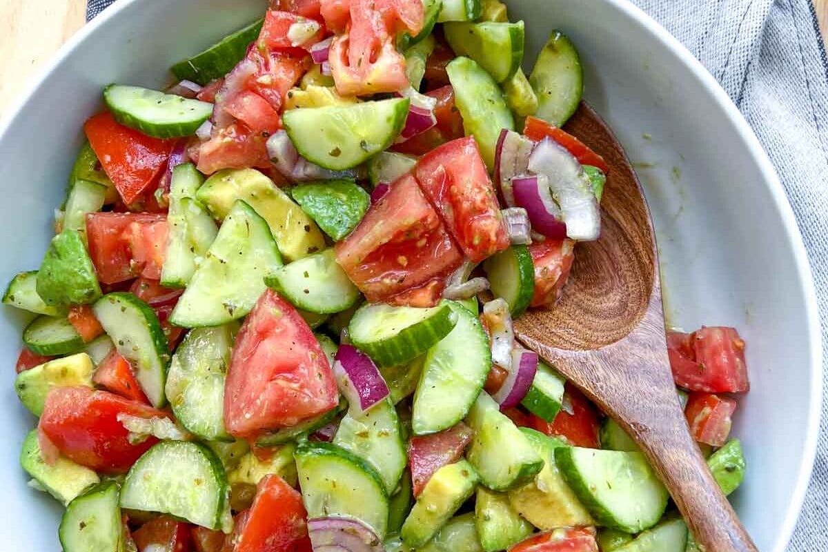 wooden spoon in a white salad bowl.
