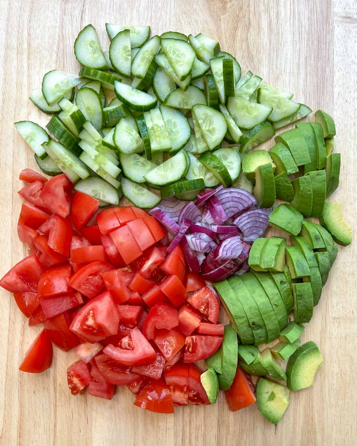 Chopped veggies on a cutting board.