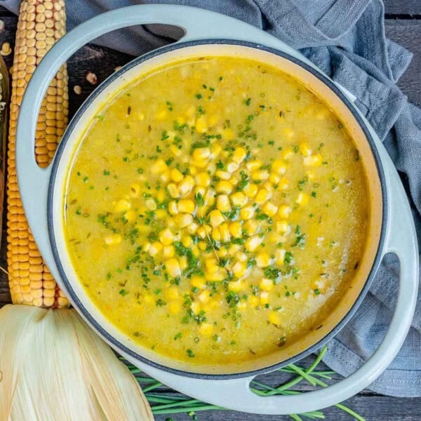 A pot filled with corn chowder.
