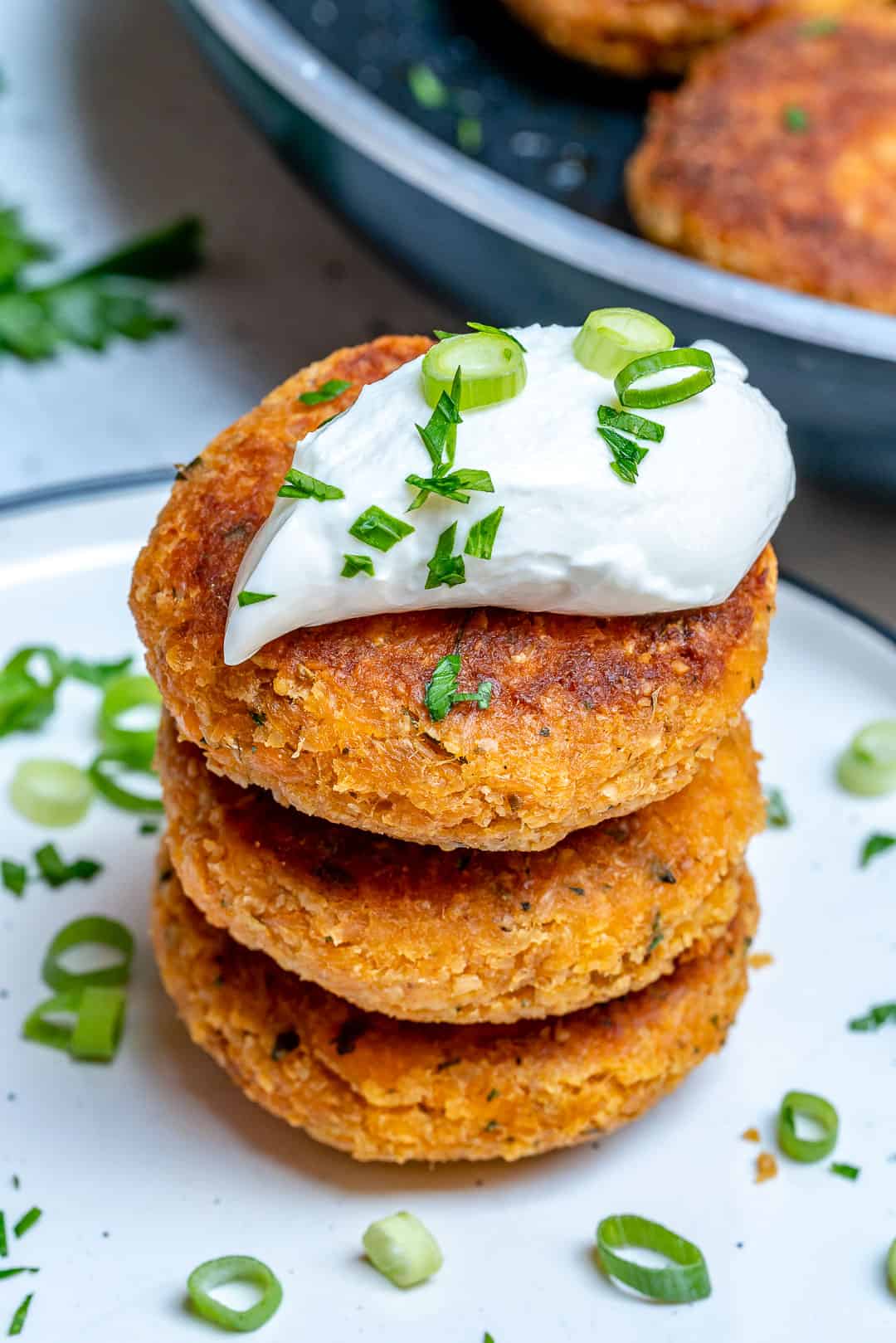 salmon cakes stacked on each other 