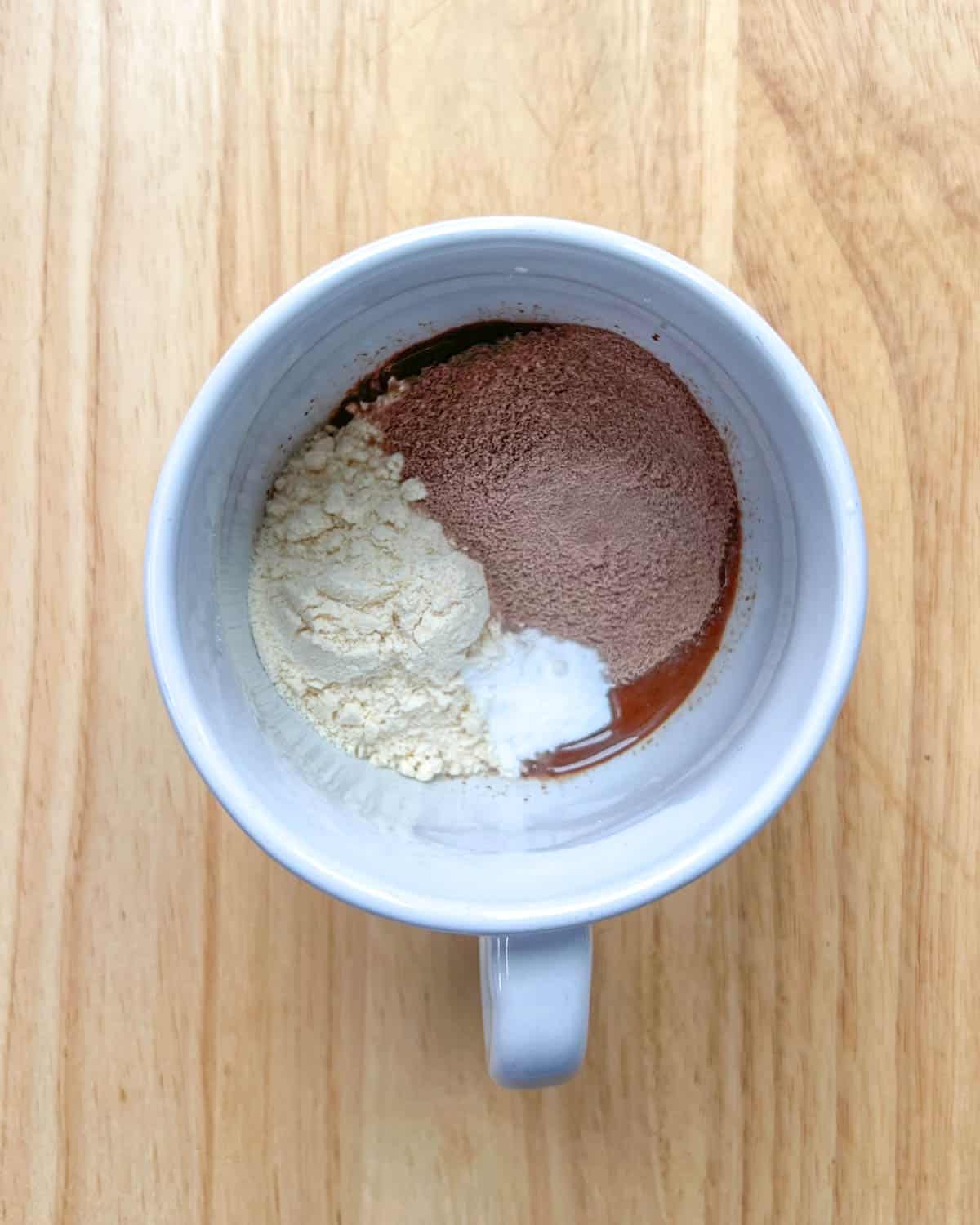 protein powder, coconut flour, baking soda, added over melted chocolate in a cup.