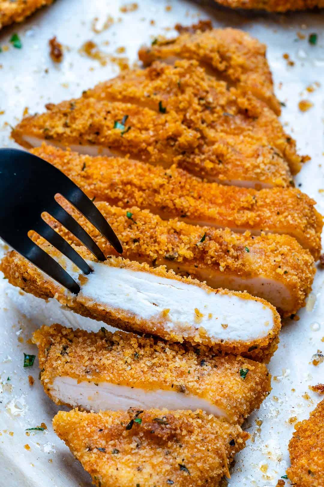 close up of sliced baked chicken strips recipe