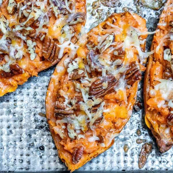 stuffed baked sweet potatoes with cheese and pecans.