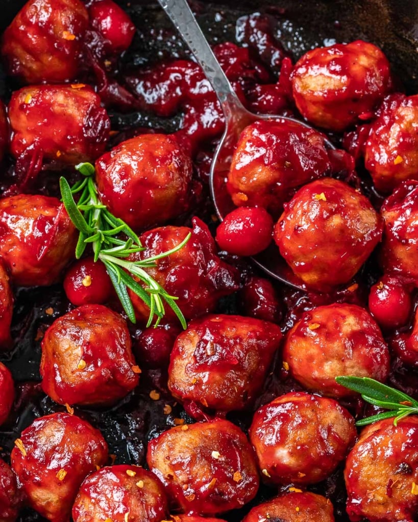 close up cranberry sauce chicken meatballs in a pan