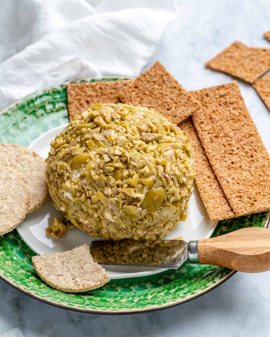 crackers on plate with easy cheese ball