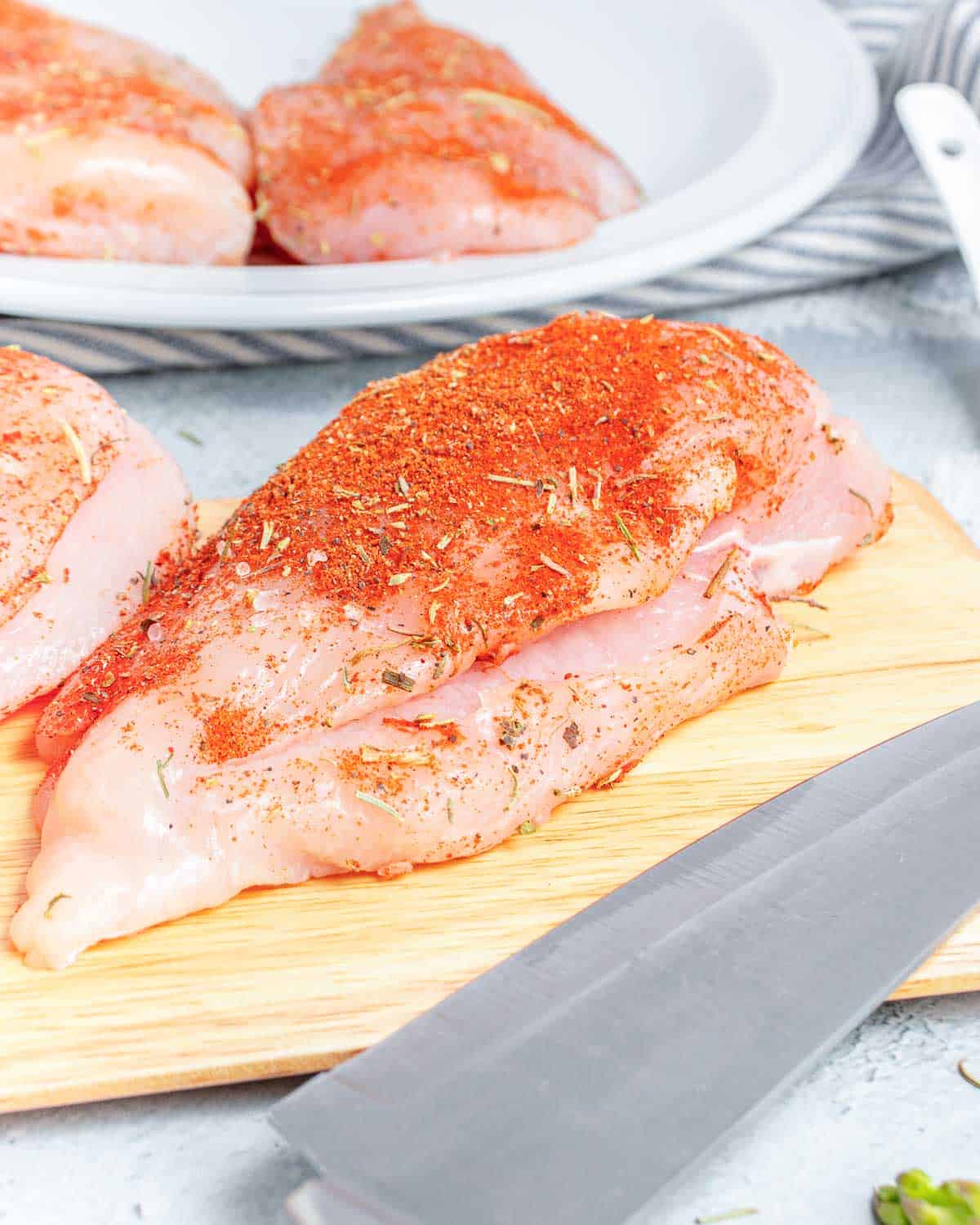 Chicken breast sliced in the middle to be stuffed.