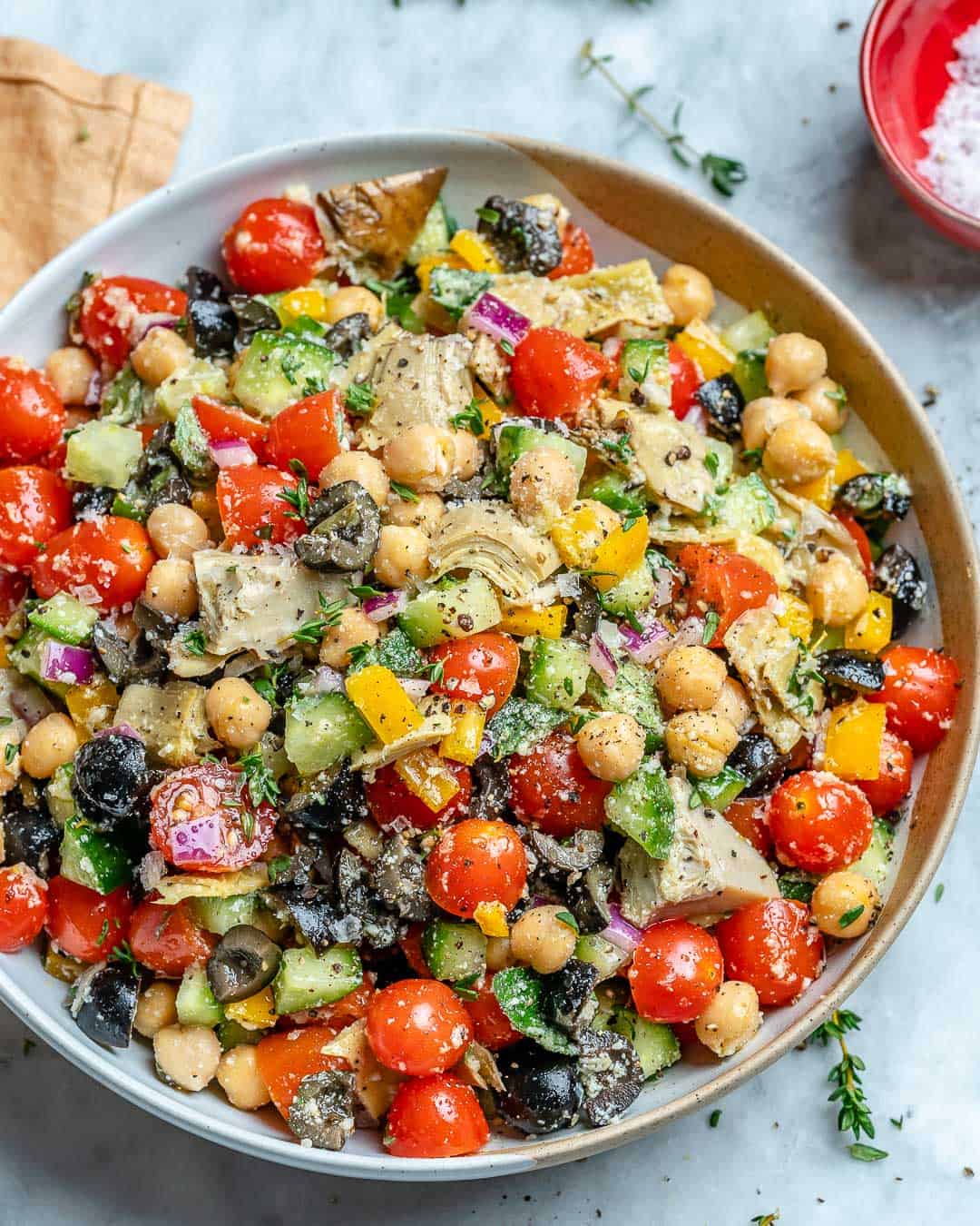 easy and healthy chickpea salad recipe with olives, feta cheese and artichoke hearts