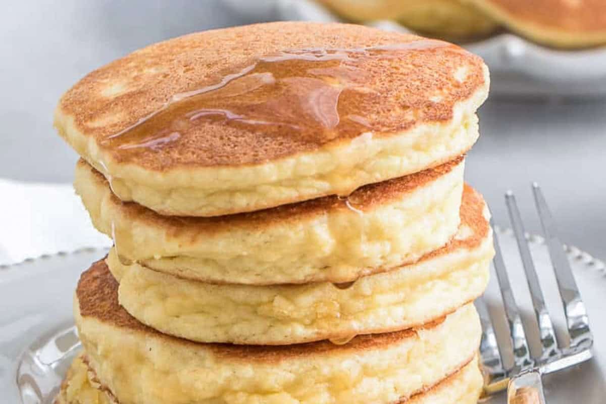 Fluffy pancakes over each other.