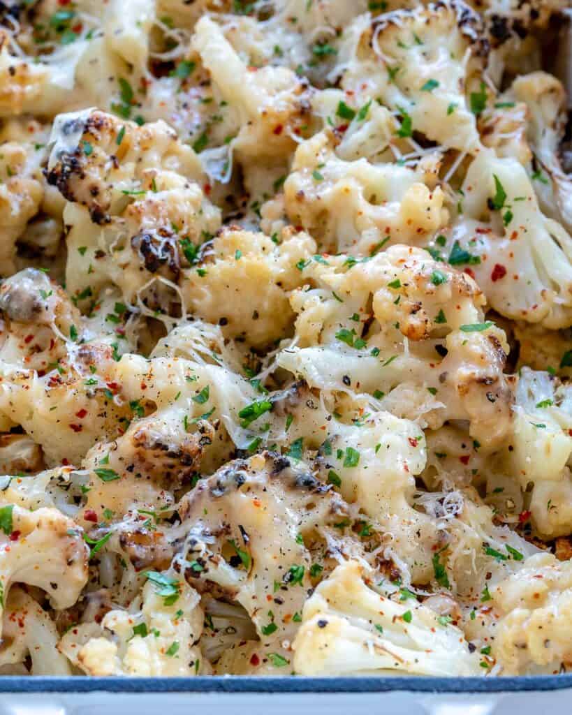 top view of a baking dish with cheesy baked cauliflower 