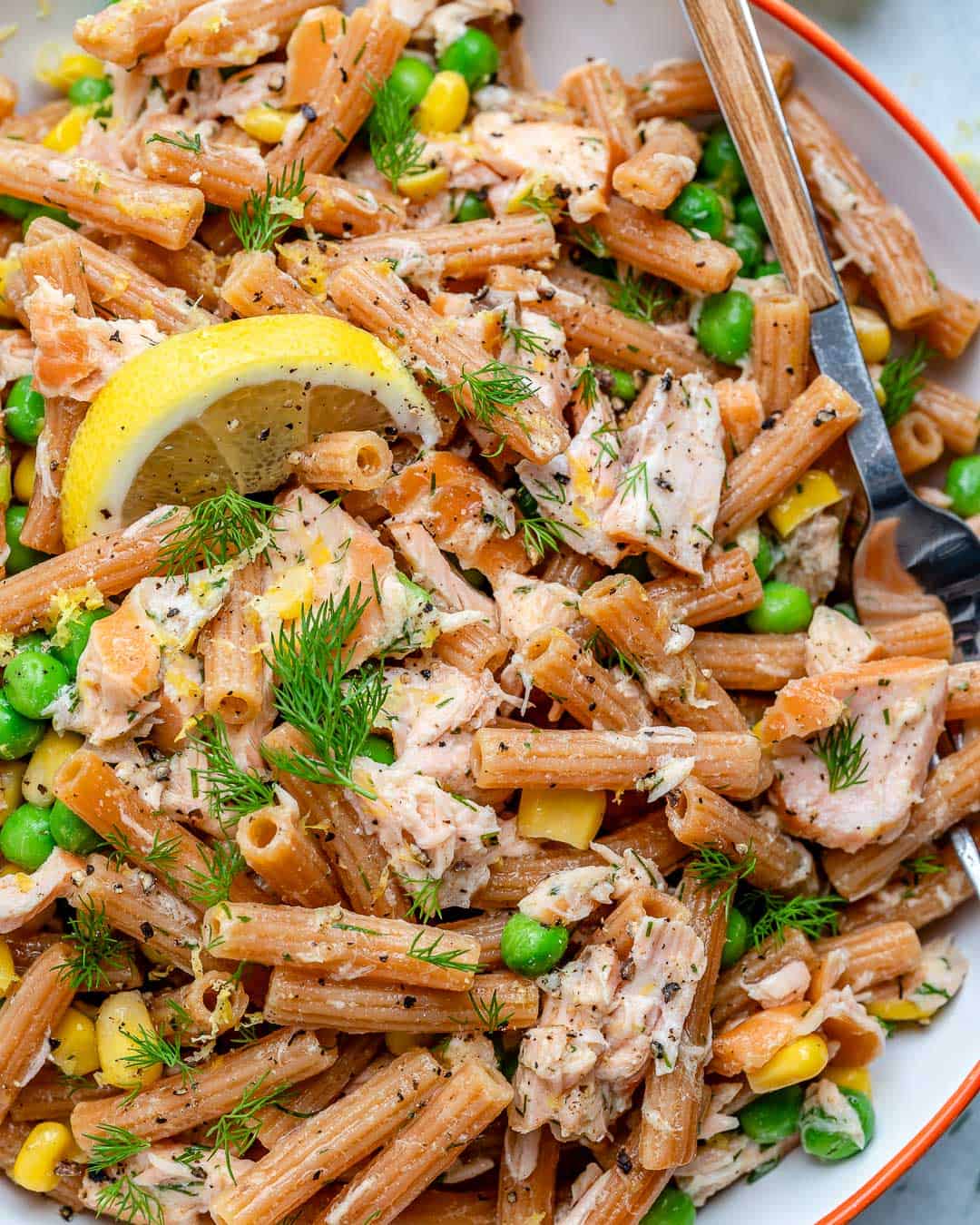 pasta salad with smoked salmon, peas, corn, fresh dill and zesty dressing 
