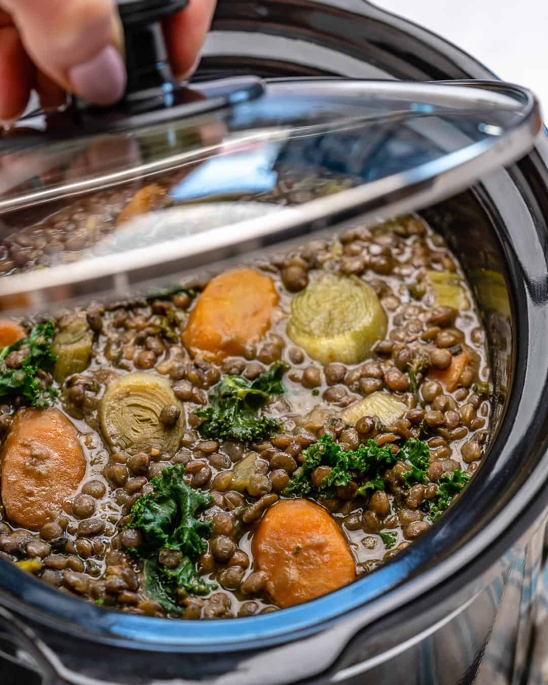 healthy lentil and kale soup made in slow cooker 