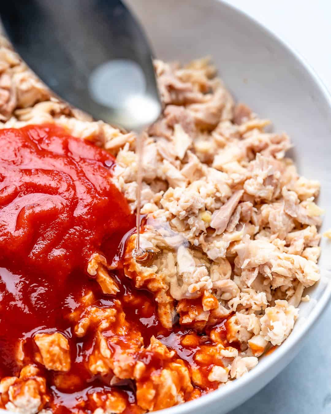 sauce on shredded chicken