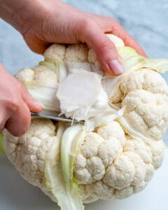 coring the cauliflower with knife