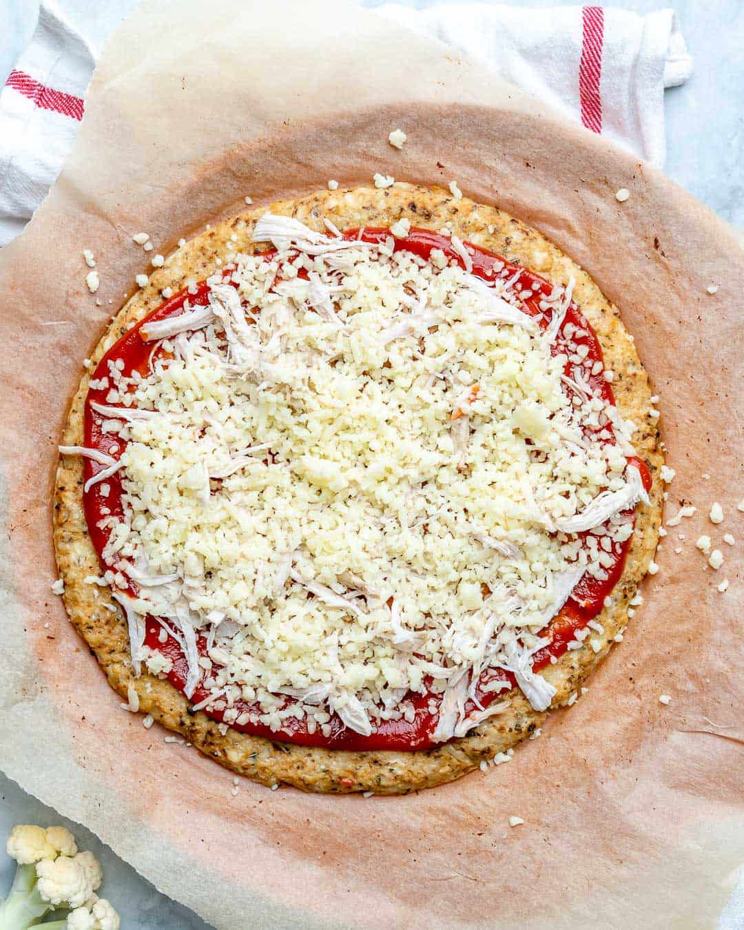 Add sauce and toppings and bake until melted.