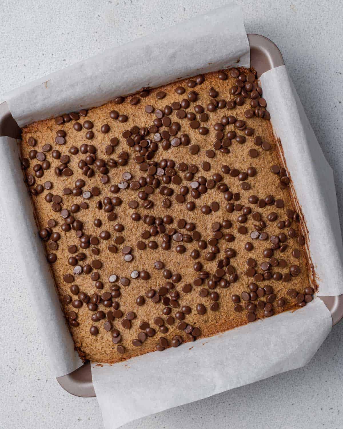 pumpkin bars baked in a pan before cutting.