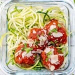 a meal prep glass of turkey meatballs with zucchini noodles.
