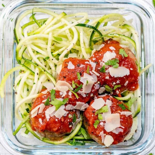 a meal prep glass of turkey meatballs with zucchini noodles.