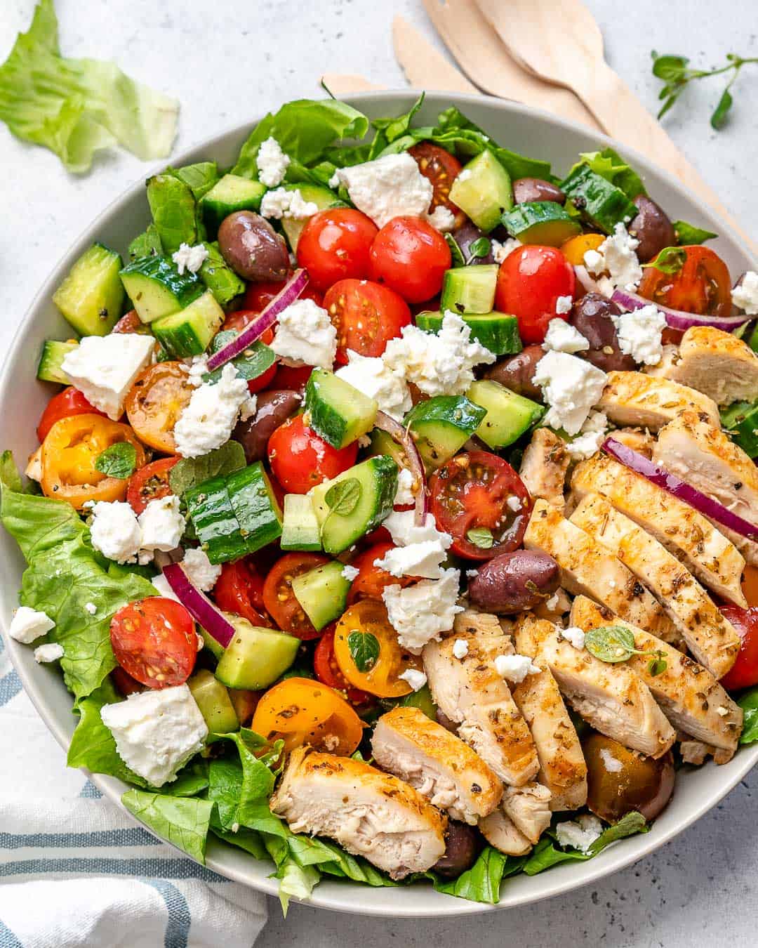 top view salad made greek style with chicken and feta cheese