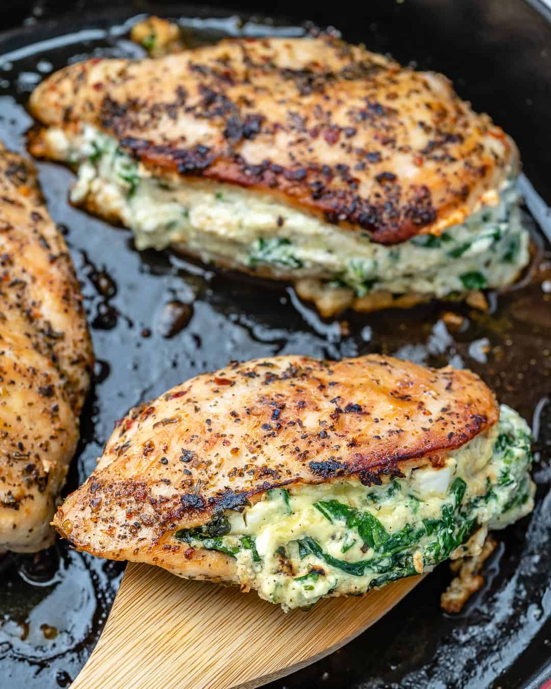 cheese stuffed chicken in a pan