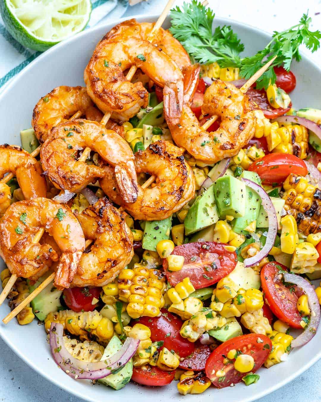 top view of salad with grilled shrimp 