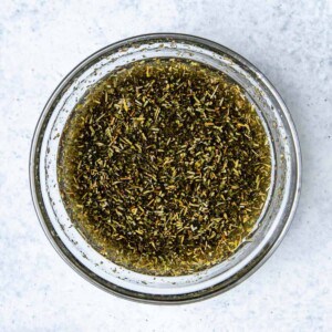 dressing in a round clear bowl.